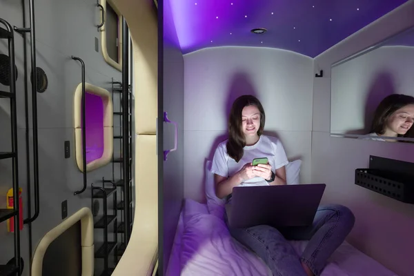 Concept of having a rest in capsule hotel