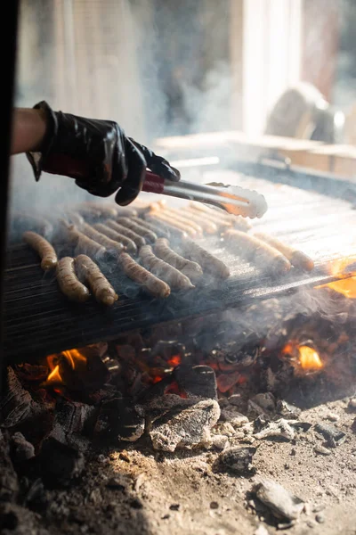 Man Frying Sausage Hot Grill — Stock Photo, Image