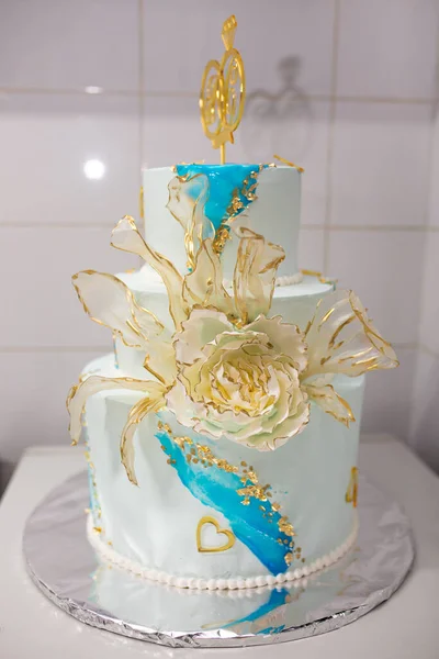 beautiful big cake with gold. festive delicious dessert.