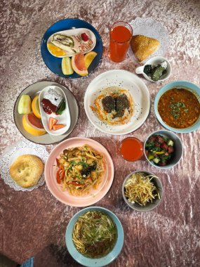 lunch in a cafe top view a table full of food.