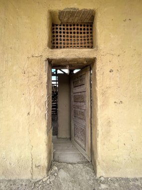 decorative entrance door to the house in oriental style.