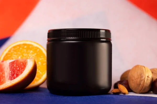 black plastic jar without logo and fruit.