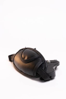 black leather camera strap on white background.