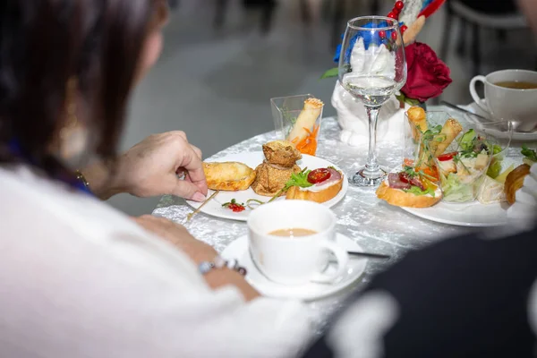 at the buffet table at the event, snacks on the table.