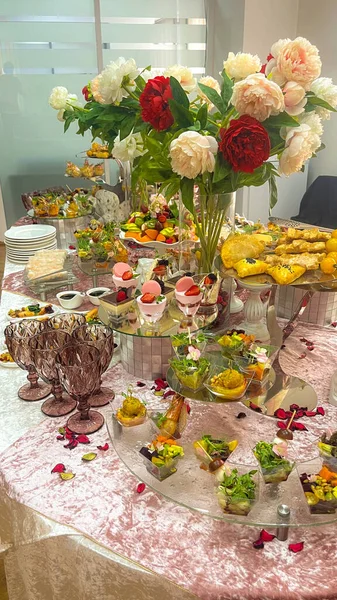 catering table set with snacks and various dishes for the holiday.