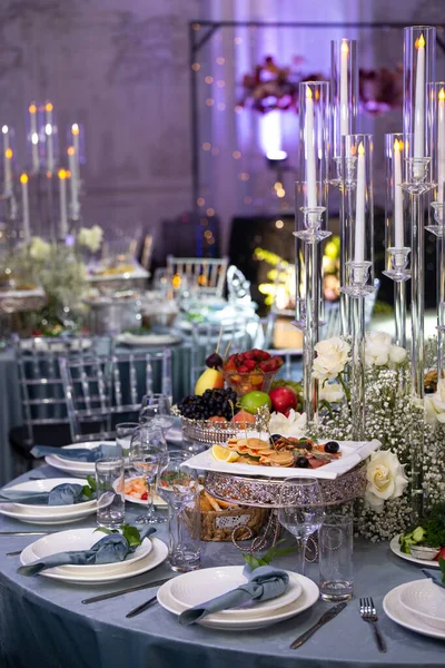 A set table for a celebration in the banquet hall.