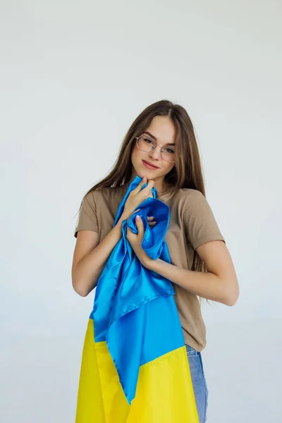 Young Pretty Woman Hug Ukraine National Flag Isolated White Background — Stock Photo, Image