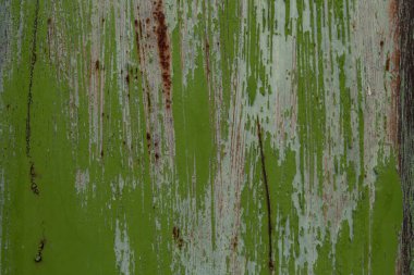 Yeşil boyayla kaplanmış metal levha. Metal arkaplan, metal doku.