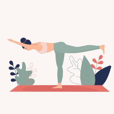 Kadın yoga yapıyor, savaş pozisyonunda duruyor. Yoga stüdyosu kavramı