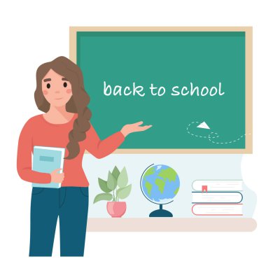 Okuldaki yazı tahtasına yakın öğretmen.