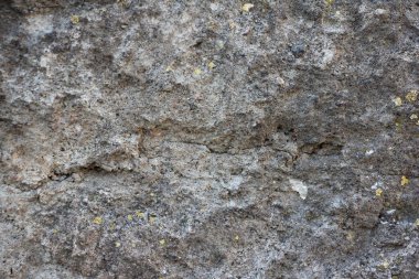 Gri, kuru beton, düz olmayan yüzey, endüstriyel kaba arka plan dokusunu kapatın.