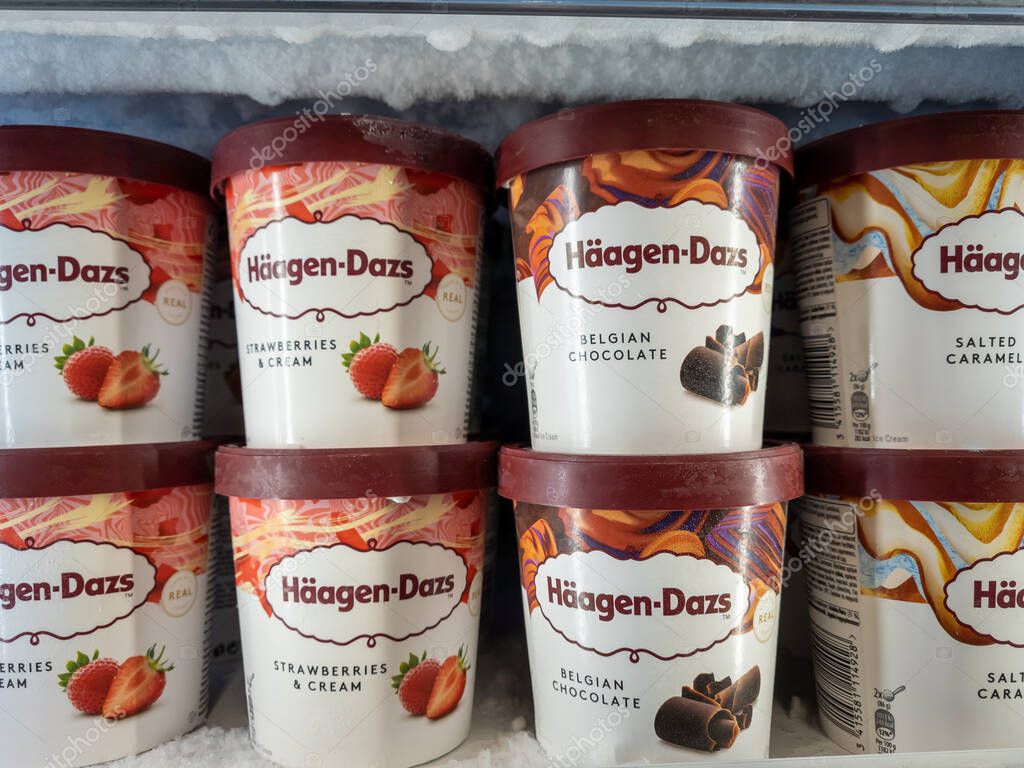 London. UK-11.21.2021. A display of Haagen-Dazs ice cream in a freezer fridge.