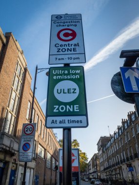 London. UK- 12.06.2020. The road sign for the Congestion and Ultra Low Emission Zone areas of the capital which drivers need to pay to enter. clipart