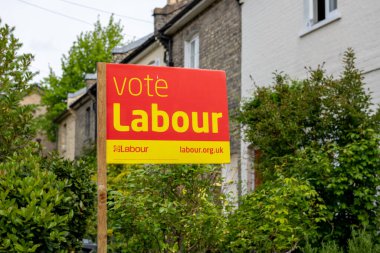 London. UK-o4.01.2022. A vote Labour sign board outside a house as part of political campaign in the coming local council election in England.