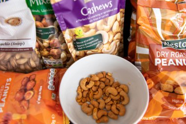 London. UK- 09.01.2022. A variety of nuts in packages.