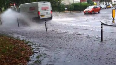 London. UK- 08.25.2022. flooded roads during heavy rain storm after record breaking Summer heat wave. Global warming.