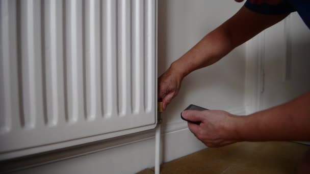 Senior Man Turning Heating Radiator Money Trying Cope Rising Energy — Vídeos de Stock