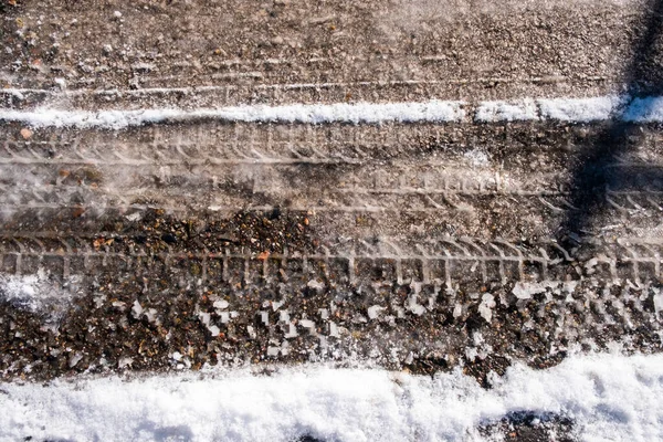 Tire Tracks Melting Snow Asphalt — Stock Photo, Image