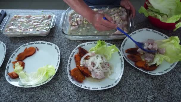 View Serving Various Dishes Ceviche Sweet Potato Lettuce Onion Kitchen — Stock Video