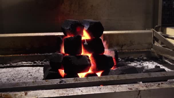 Beatiful Closeup Hexagon Shaped Pile Coals Hole Middle Grill Smoking — Stock Video