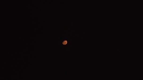 View Orange Moon Dark Night Sky Blurring End — стоковое видео