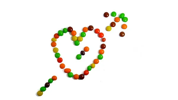 Collection Colorful Candies Forming Heart Arrow — Stockfoto