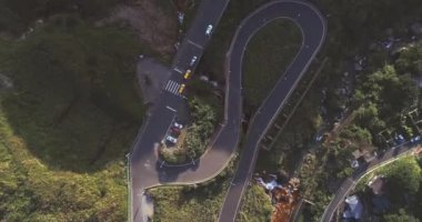 Beautiful Winding Road with stream in Ruifang