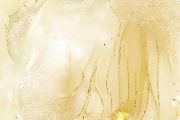 Abstract fluid art background with alcohol ink technique decorated with glittering gold foil for a luxurious look. Suitable for backgrounds, banners, greeting cards, or wall decoration.