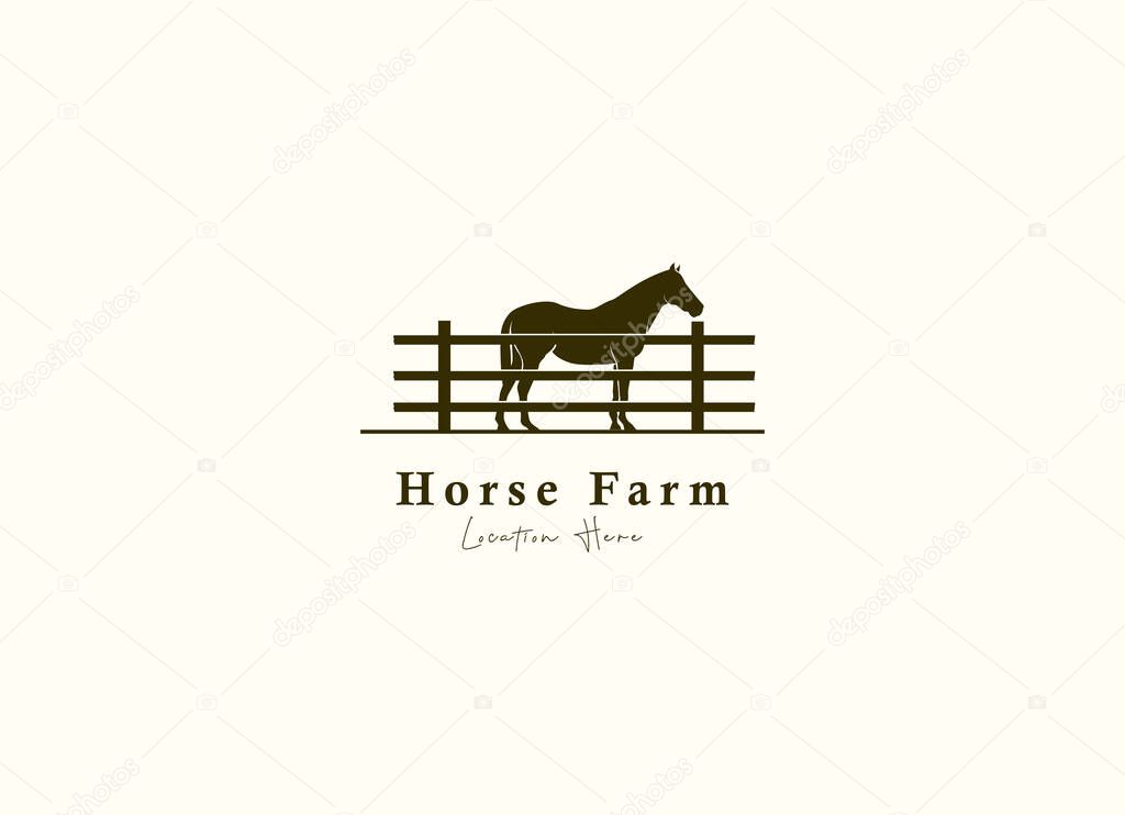 Horse silhouette behind wooden fence paddock for vintage retro rustic countryside western country farm ranch logo design