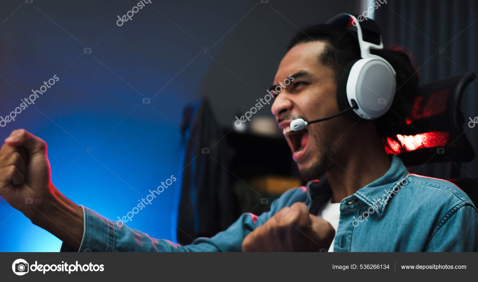 Young Asian Man Playing Online Computer Video Game Colorful Lighting Stock Photo by ©beer5020.gmail 536266134