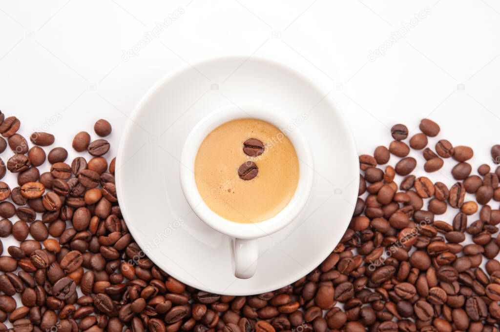 cup of coffee and coffee beans isolated on white background