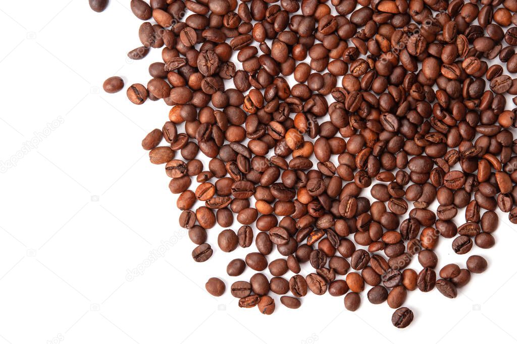 scattered coffee beans isolated on white background