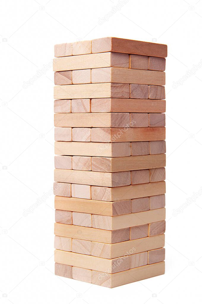 block wooden play isolated on white background. Construction and development concept 