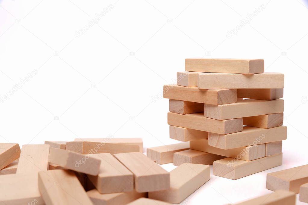 block wooden play isolated on white background . Construction and development concept 