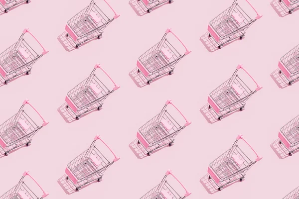Pastel Pembe Arka Planda Süpermarket Alışveriş Arabasının Deseni Paketleme Için — Stok fotoğraf