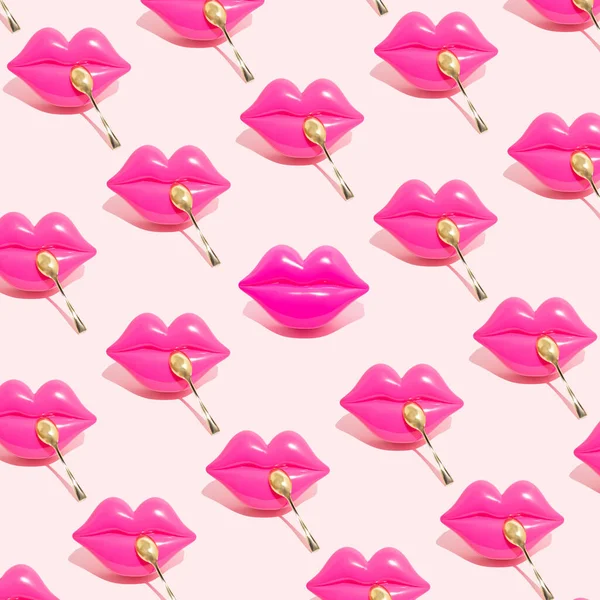 Creative seamless pattern of pink kiss lips with golden spoon isolated on a pastel pink background. Break the pattern. Concept of beautiful kiss, tasty, sweet food or dessert lovers.