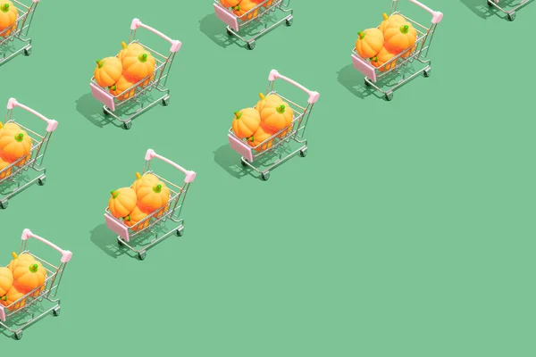 Halloween Festival Shopping Concept Little Pumpkins Shopping Cart Green Background — 스톡 사진