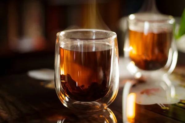 Glass Black Tea Glass Double Bottom Rays Evening Sun — Stock Photo, Image