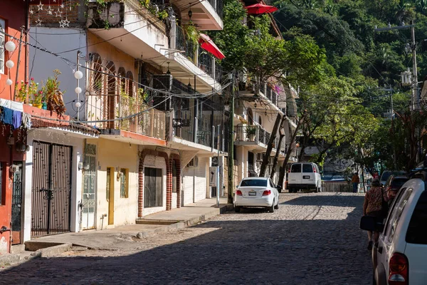 street view of houses and apartments and cars in rural Puerto Vallarta