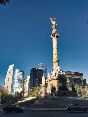mexico city, mexico - February 09 2017 : a huge square with the famous statue angel of independence in gold plated