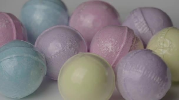 Bath Bombs in Different Colors Spin — Vídeo de Stock