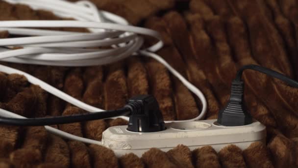 Female Hand Inserts a Plug Into a White Extension Cord — Vídeo de Stock