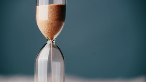 Countdown Hourglass Pouring on Blue Background — Αρχείο Βίντεο