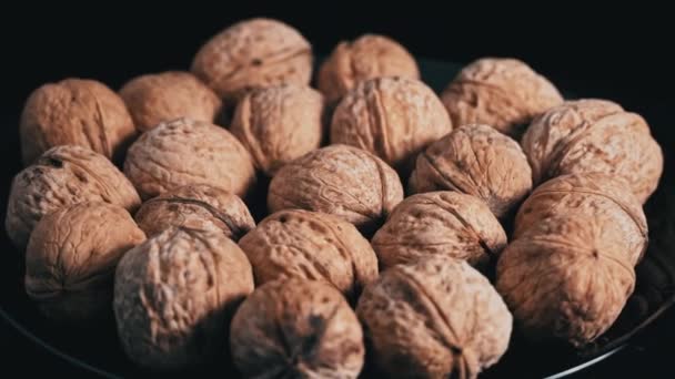 Lot Walnuts Shell Spinning Black Background Nuts Good Brain Heap — Vídeos de Stock