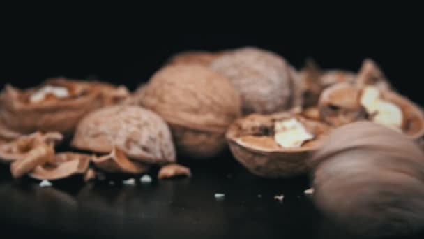 Whole Walnut Rolls Slow Motion Background Pile Nuts Loop Lot — Vídeos de Stock