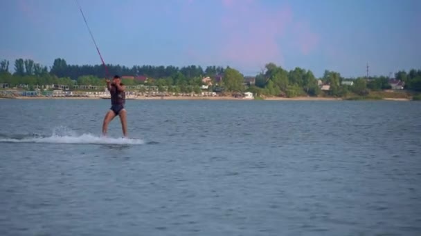 Man Rides Wakeboard Blue Water Water Sports Water Entertainment Tourists — Wideo stockowe