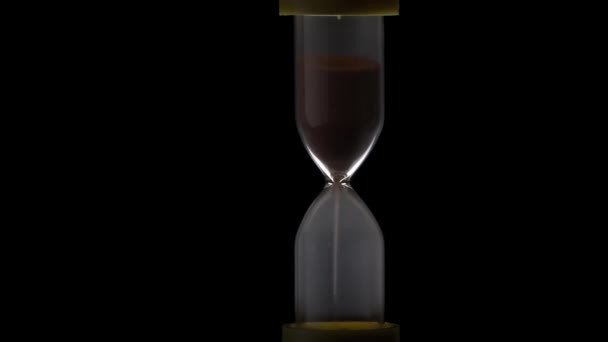 Sand Hourglass Crumbles Dark Countdown Hourglass Pouring Black Background Sand — Wideo stockowe
