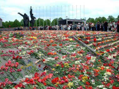 Latvia, Riga. Monument to the soldiers of the Soviet Army - the liberators of Soviet Latvia and Riga from the Nazi invaders. Memorial Complex. Memorial Complex. On the square at the foot of the monument, the inhabitants of Riga laid thousands of flow