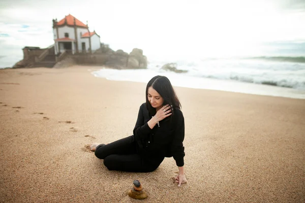 Young Beautiful Girl Sits Sand Marimar Beach Portugal Her Orthodox Лицензионные Стоковые Фото