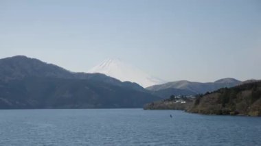 Mount Fuji view from a moving boat on a lake Ashi in Hakone National Park.